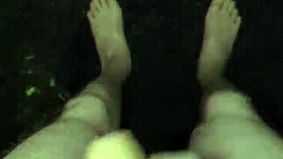 Masturbating in the rain, this guy goes wild with his huge tool.