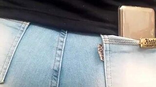 A Brunette Shows Off Her Hot Ass In The Market While Being Spied On.