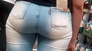 A Brunette Shows Off Her Hot Ass In The Market While Being Spied On.