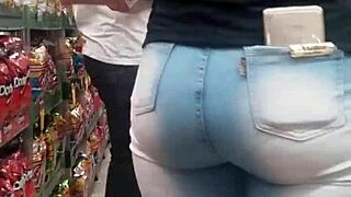 A Brunette Shows Off Her Hot Ass In The Market While Being Spied On.