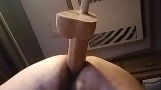 I'm bent over in doggystyle, sliding the huge dildo into my pussy