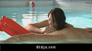 sweet redhead teen 18+ sucking old man’s cock by the poolside 😏