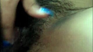 I watch her small tits while she masturbates passionately