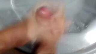 just chilling in the bathroom after the game, stroking my cock