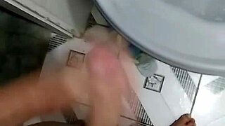 just chilling in the bathroom after the game, stroking my cock