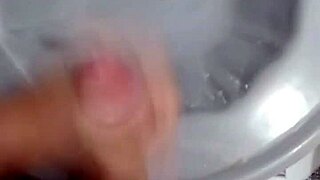 just chilling in the bathroom after the game, stroking my cock