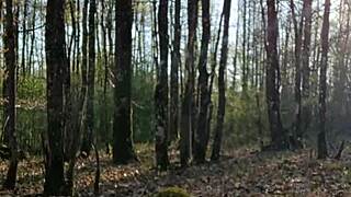 female slave performs outdoor self-session in bizarre setting