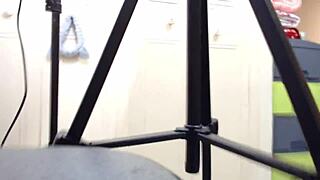 Feeling the thrill of satin lingerie, this amateur slut engages in clothed fucking with dirty talk leading to cumshot.