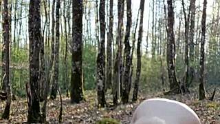 female slave performs outdoor self-session in bizarre setting