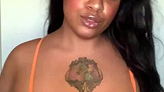 milf in bikini dances seductively on the beach