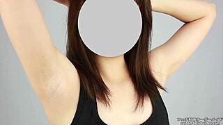 Japanese girl explores her wild side with armpit fetish play in private.