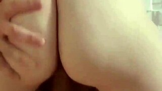 redhead sitting in a homemade video with tight movements