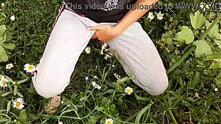 Spying on neighbor's outdoor orgasm among daisies, so hot