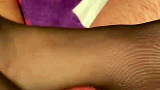 Giving The Hubby A Footjob In Black Reinforced Toe Stockings