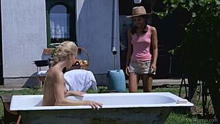 Blonde Nesty and brunette Shrima Malati in outdoor lick session