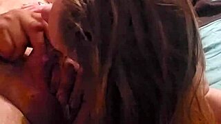 The sexy redhead starts teasing the cock, then sucks and licks the balls intensely