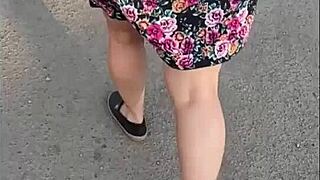 Caught this chubby teacher on the street, skirt and thong flashing big natural tits.