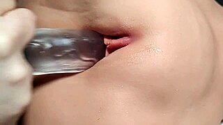 bored girl picks at her shaved pussy close up