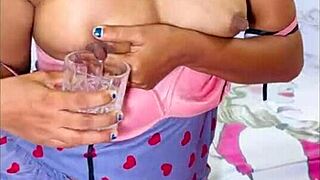 solo indian housewife milks boobs into glass, then slides dildo deep in shaved pussy
