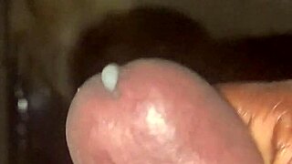 He strokes his big cock slowly, building up to climax