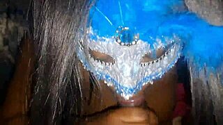 masked ebony gives blowjob, swallows cum