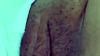 Latina woman masturbates in room, hand on grill, twerking ass, moaning passionately