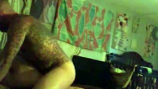 Two lovers engage in foreplay.