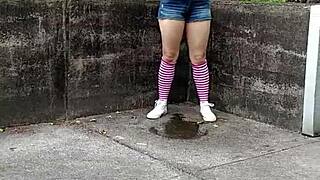 Naughty Old Whore Indulges in Risky Public Pissing Fantasy at Hydroelectric Plant Wearing Stockings and Shorts Outdoors