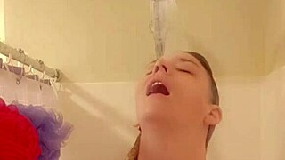 In the shower, she gets wet and starts touching herself sensually.