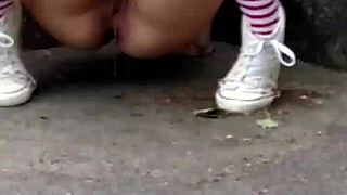 Naughty Old Whore Indulges in Risky Public Pissing Fantasy at Hydroelectric Plant Wearing Stockings and Shorts Outdoors