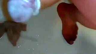 Xrated Scene: Detailed View Of A Man Stroking His Cock While Bathing In The Shower