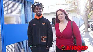 Lucia Bianco gives a quick titjob to a black guy.