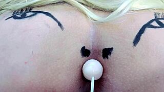 Pink Ass Spreads With Buttplug In Sheer Red