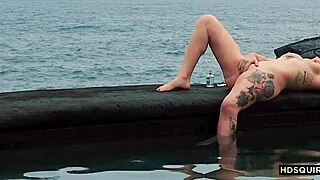 Free spirit girl enjoys solo time by the shore