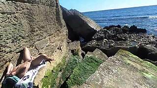 African nudist prostitute shows off her ass on the beach