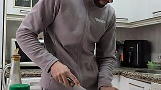 Pornstar undresses while cooking, masturbates, and cums on the food.