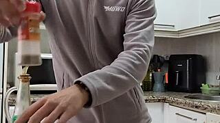 Pornstar undresses while cooking, masturbates, and cums on the food.