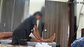 Hidden cam catches the masseuse giving a happy ending with her hands