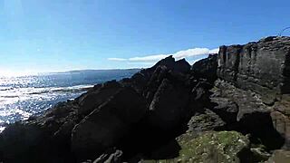 African nudist prostitute shows off her ass on the beach