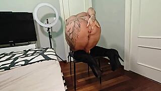 dominatrix danaxmuscles gives orders in boots