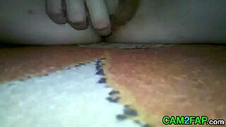 A Russian woman indulges in solo masturbation.