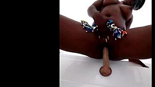 Zulu Native With Nice Tits Inserts Dildo Deep In Pussy