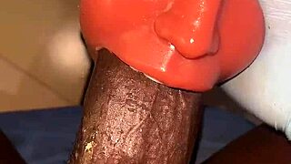 The young black slave in stockings deep throats her huge sextoy like a slave till nasty blowjob