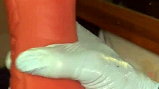 The young black slave in stockings deep throats her huge sextoy like a slave till nasty blowjob