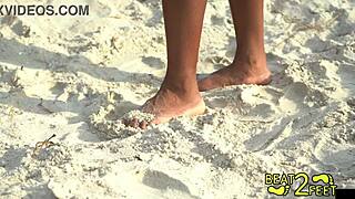 Giggles' Feet Get Sandy At Beach