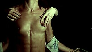 hands explore a dark fantasy with brunette