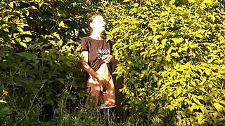 in a daring outdoor adventure, a brunette woman explores self-pleasure amidst nature, leading to an intense personal climax