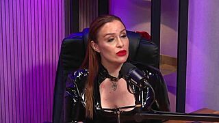 Isn't the redhead milf dominating as the ultimate BDSM queen in her leather corset?