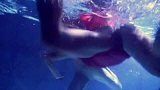 lilia mihalkova and natalia kupalka dive into underwater fun as russian lesbian babes in the pool.