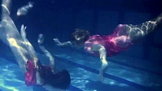 lilia mihalkova and natalia kupalka dive into underwater fun as russian lesbian babes in the pool.